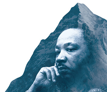 Martin Luther King Jr superimposed in front of a mountain