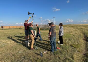 Students at Marshall Mesa installing a weather instrument.