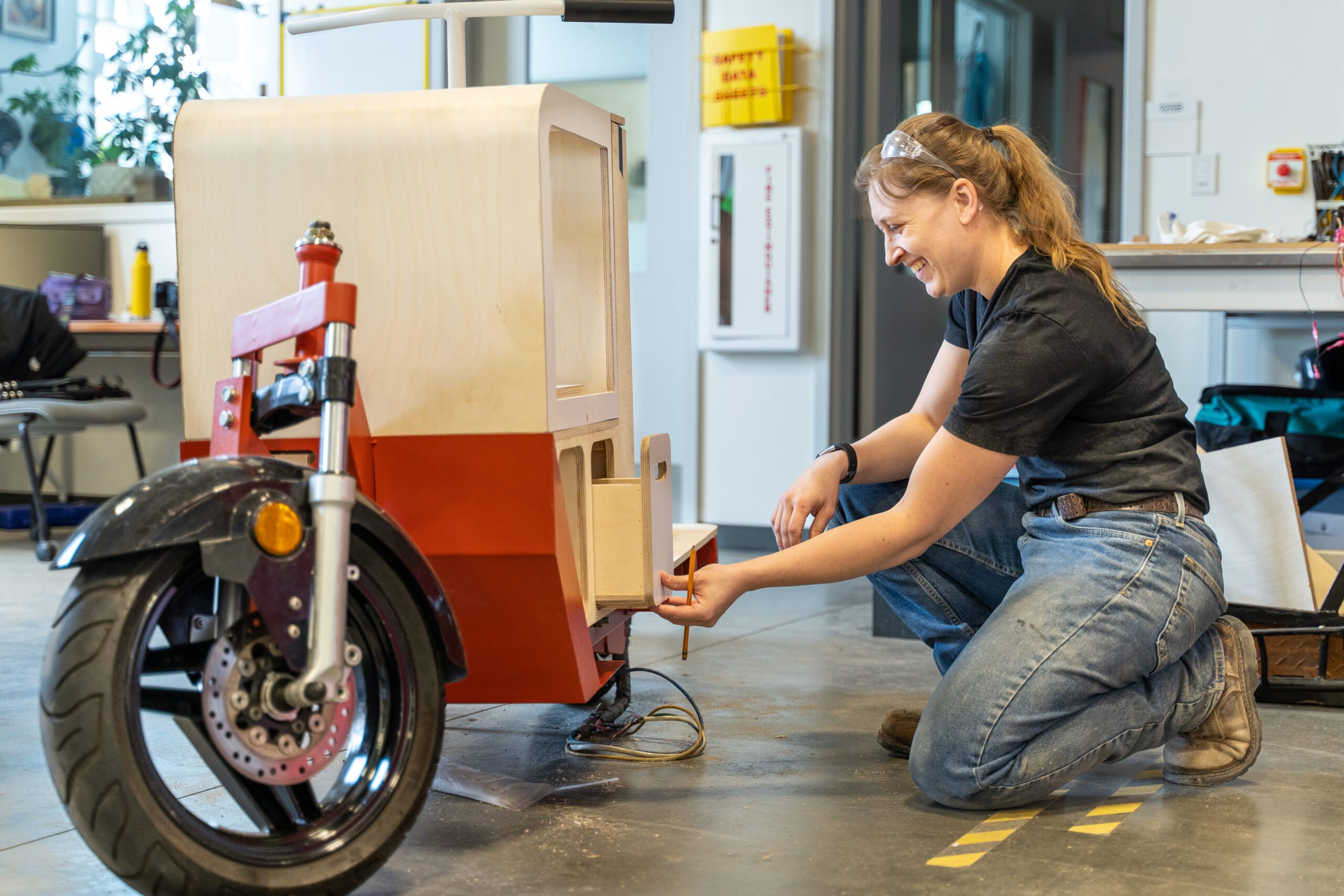 MSU Denver Industrial Design students work on creating a functional electric cargo bike. Lydia Snyder