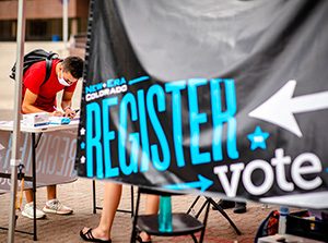 Socially distanced, masked student voter registration on campus in Sept. 2020.