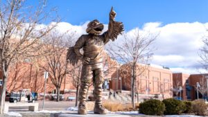 The Rowdy the Roadrunner statue in front of the Tivoli on a sunny afternoon in January 2024