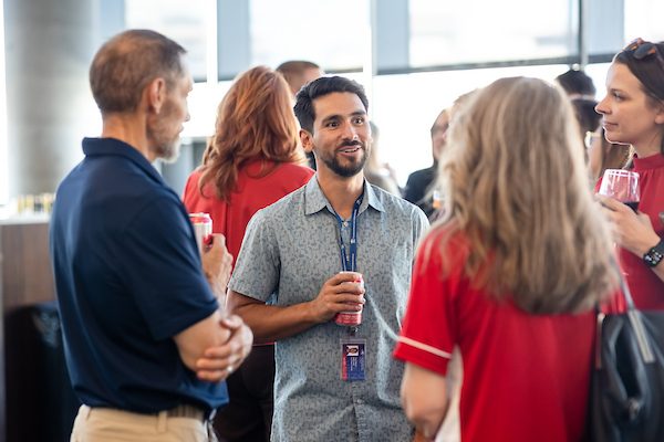 MSU Denver Staff and Faculty mingle at an event.