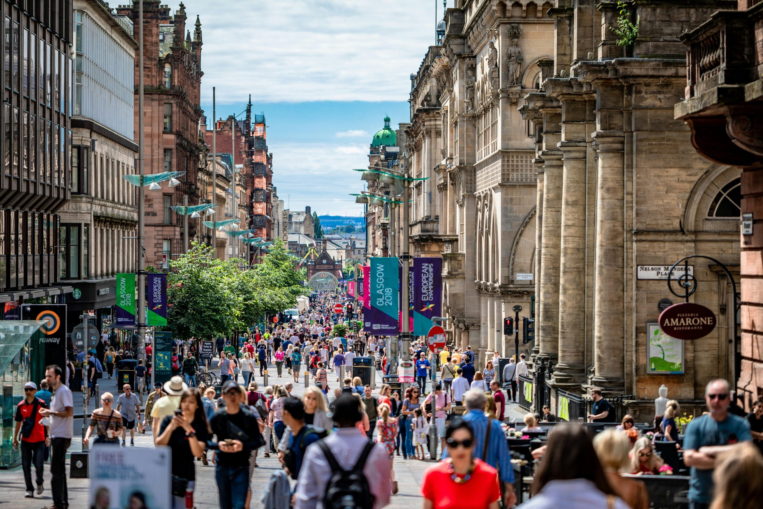 People walking in downtown Glasgow, Scotland.