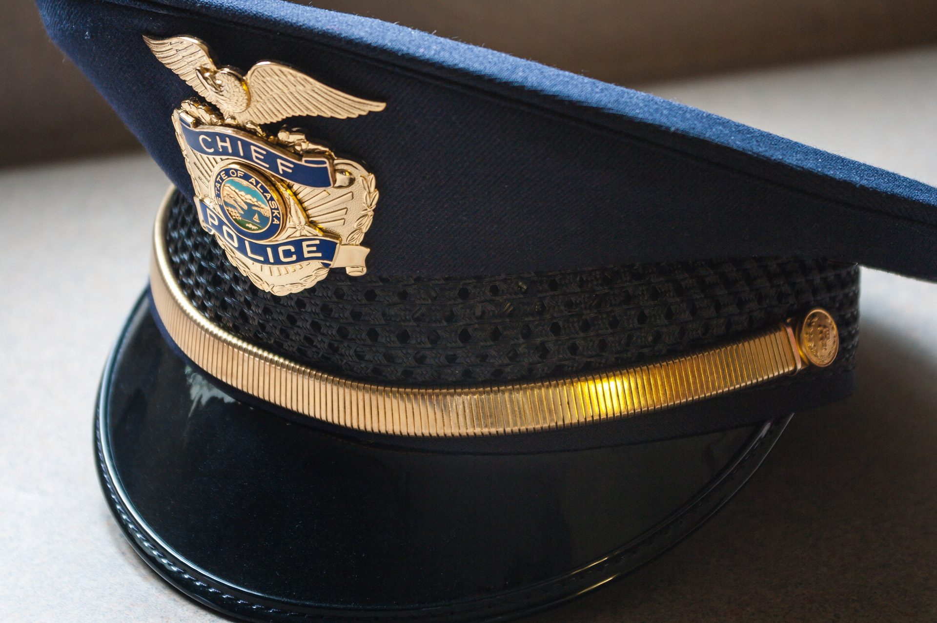 Police chief hat, navy blue with gold trim and logos