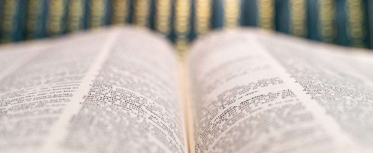 A close up and blurred photograph of an open book.